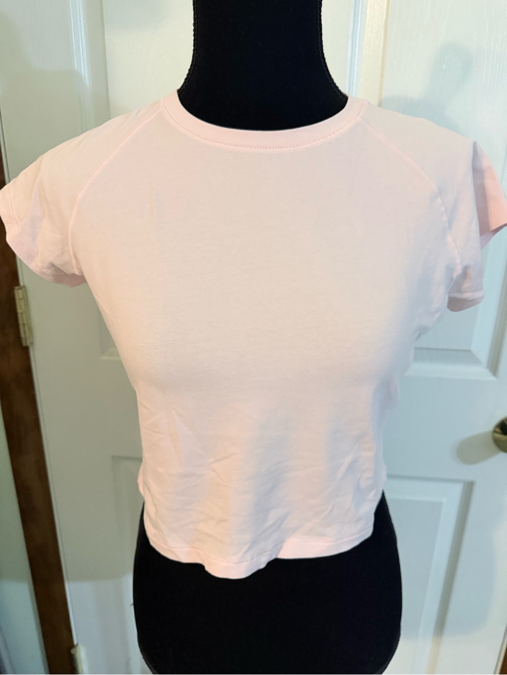 SKIMS Pale Pink Short Sleeve Crewneck Crop Top